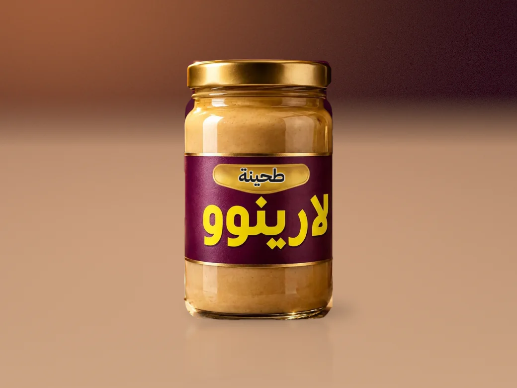 مرطبان زجاجي من طحينة السمسم السورية من لارينوو مكتوب عليه طحينة